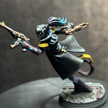 Harlequin Player